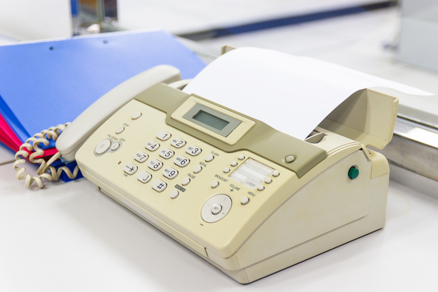 The fax machine for Sending documents in the office concept equipment needed in office