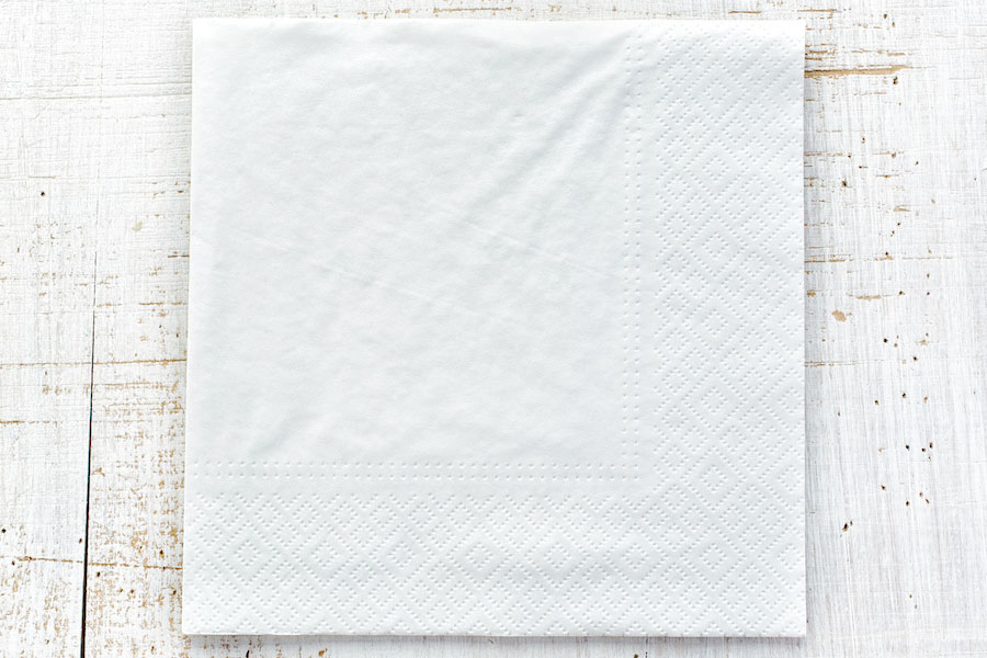 white paper napkin on wooden table