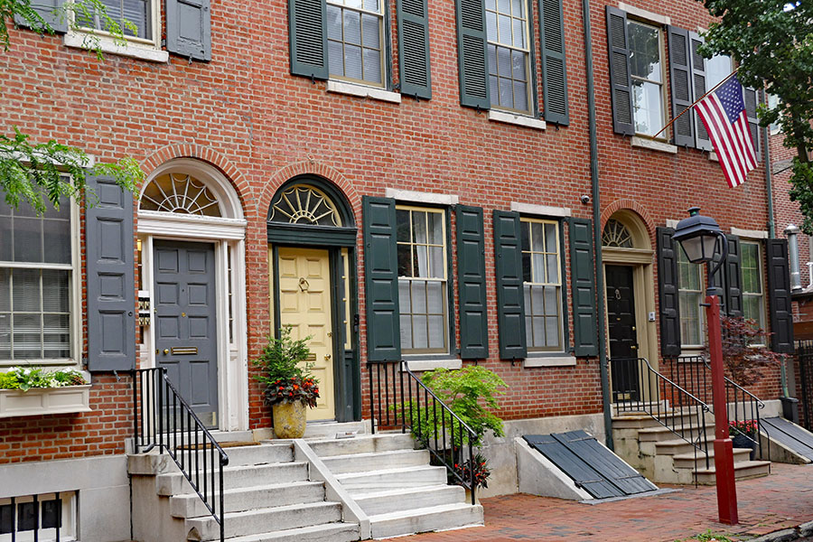 Row of brick American colonial style  townhouses