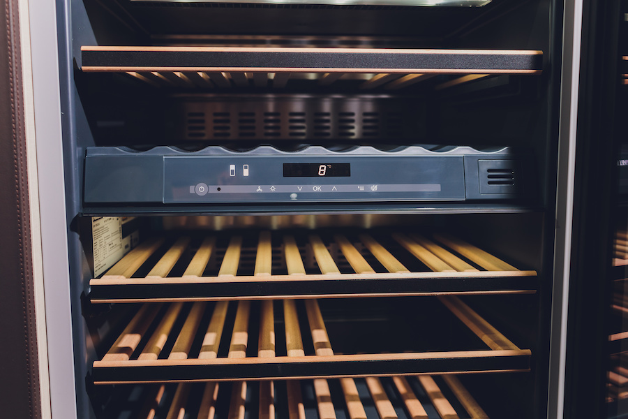 Empty Wine fridge in a kitchen home rack